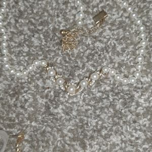 pearl necklack with real gold and diamonds